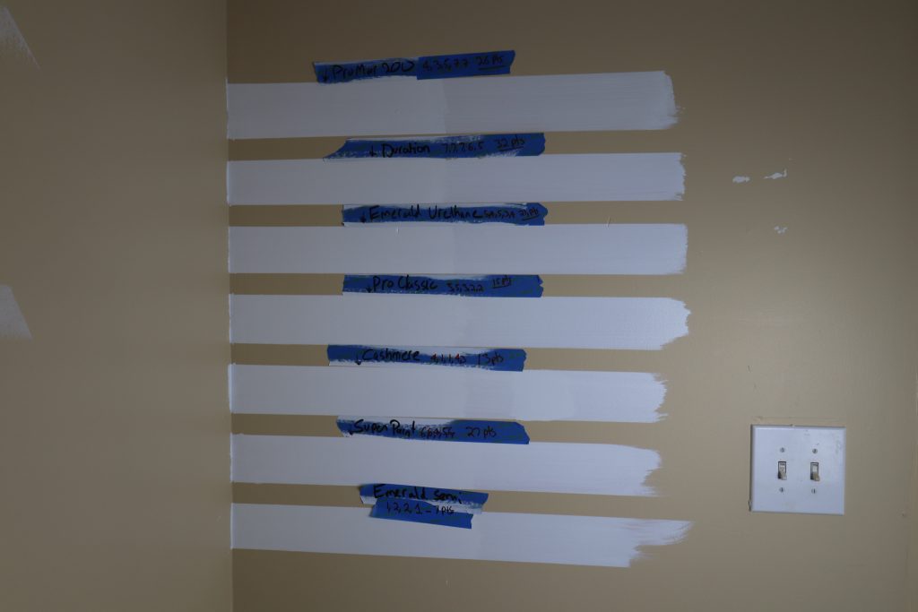 Sample board of 7 Sherwin Williams paints to determine which SW Paint covers the best