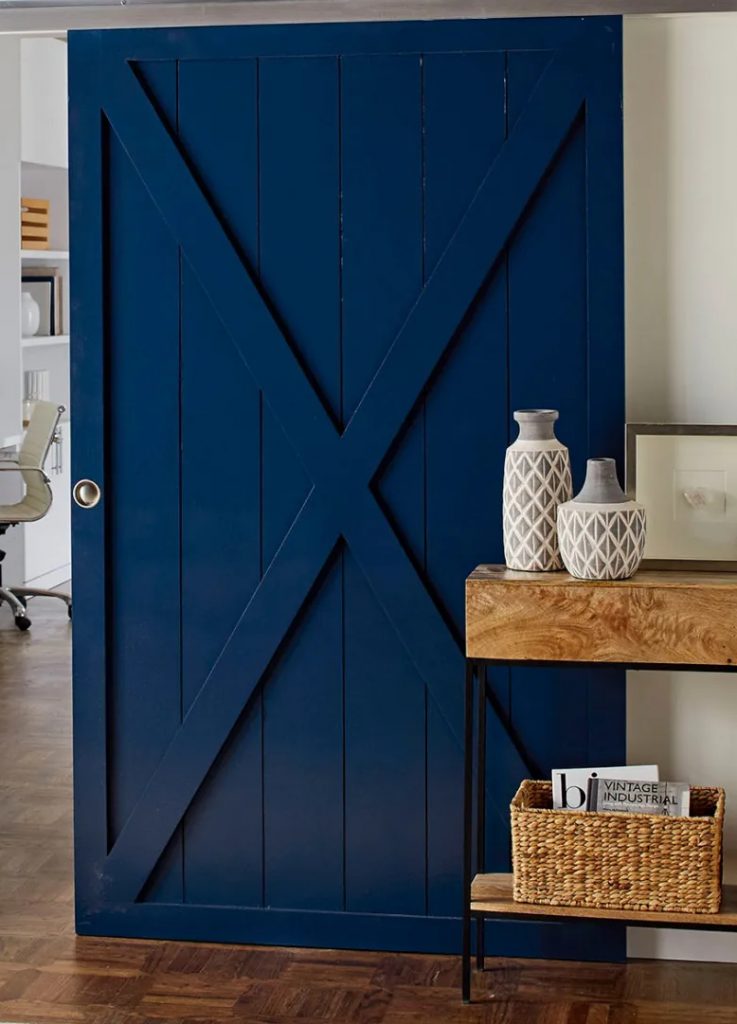 Door Installation like this blue door make functional and beautiful additions to this home