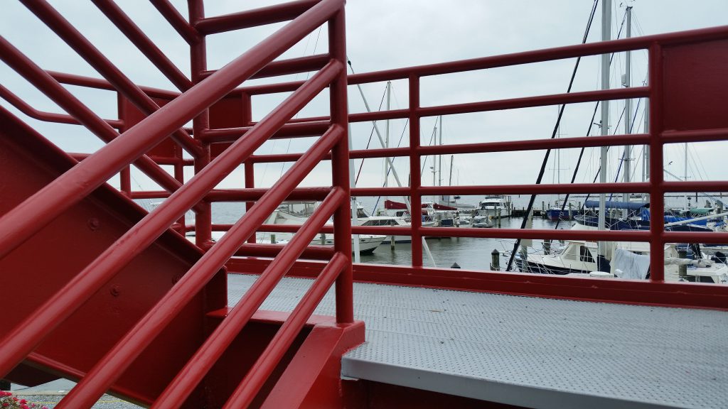 commercial painting of red handrail