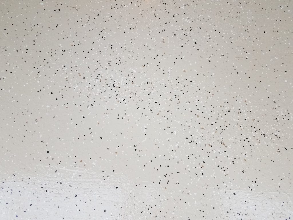 Check with your garage floor epoxy contractor near me about adding sprinkles to the paint before it dries