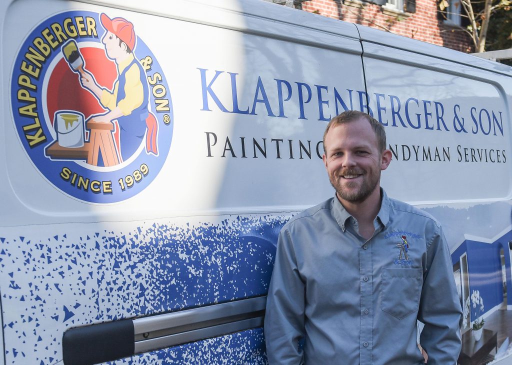 Interior Painting in Severna Park is something Daniel Tucker Shown here by his truck can provide.