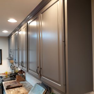 Painted kitchen cabinets from a stain to a dark taupe